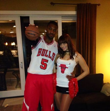 Melanie and her husband, Jason wearing Chicago Bulls Jersey