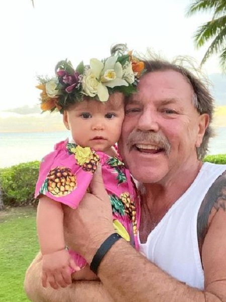 Ron Van Olphen with his granddaughter Summer Moon Honey Davies.